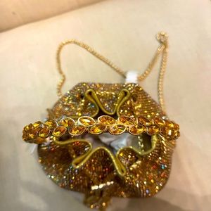 Stunning Evening Satchel with gold embellishments.